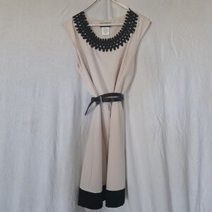 Elegant Cream and Black Dress with Belt